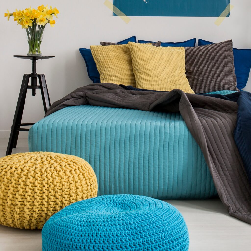 Colorful bedroom interior with poufs