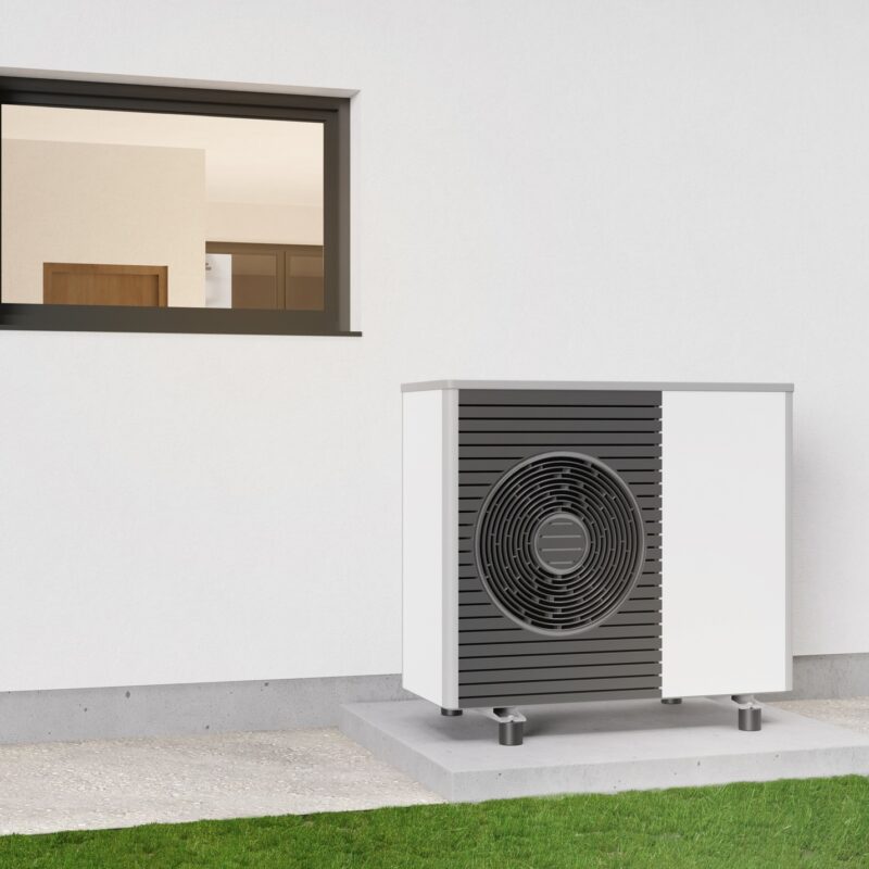 Air heat pump standing outdoors. Modern, environmentally friendly heating.